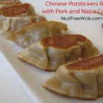 close up view of chinese potstickers with pork and napa cabbage