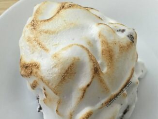 An allergy friendly aquafaba baked Alaska that has been browned with a kitchen torch that is ready to eat! #eggfree #nutfree