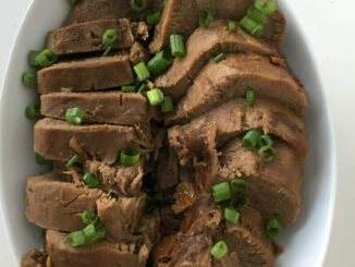 Instant Pot Beef Tongue, sliced, arranged, and ready to serve with a drizzle of soy-free soy sauce!