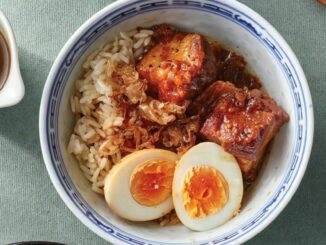 lu rao fan, braise pork and egg rice bowl close up